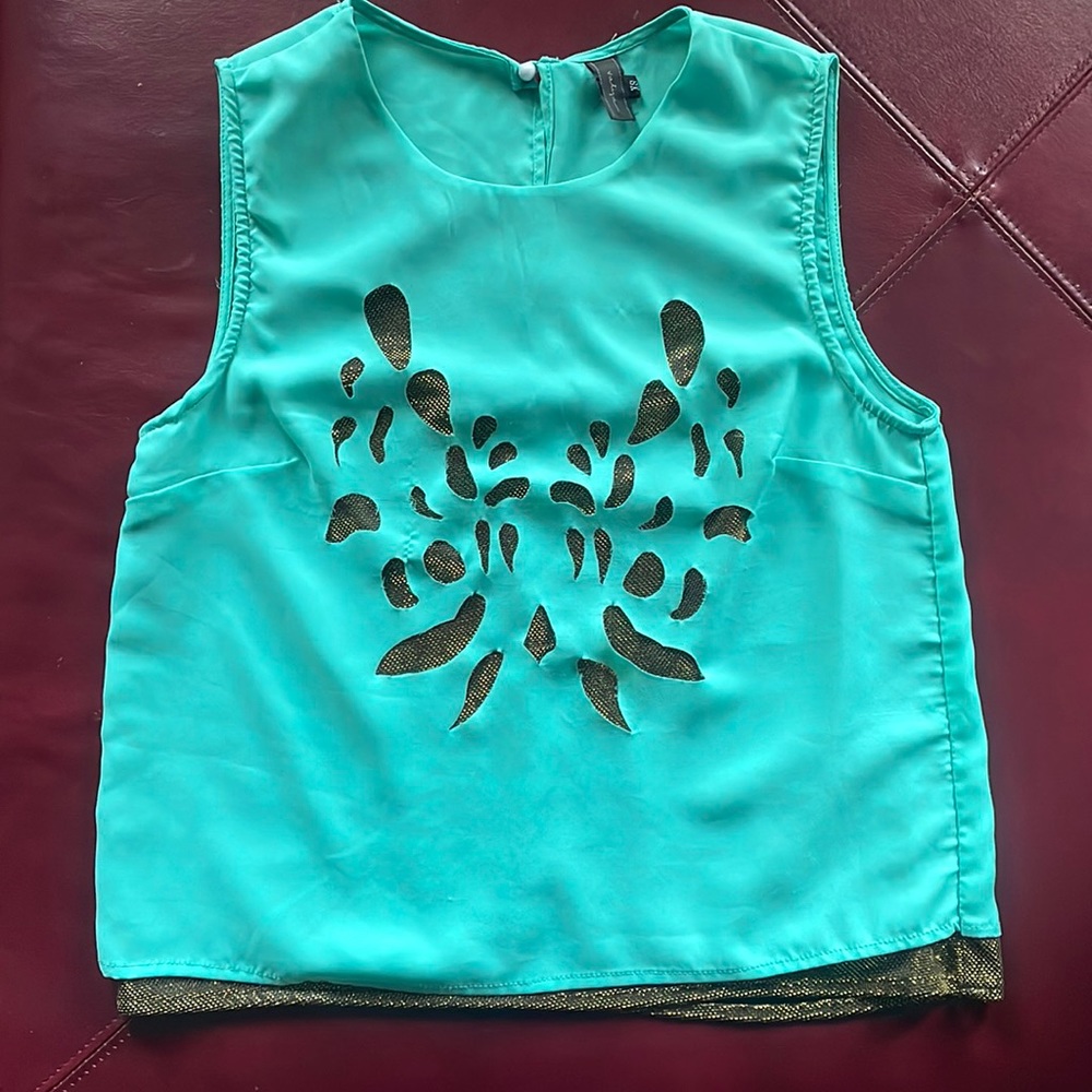 Soft XS top from Valija. Runs bigger; can fit S as well.